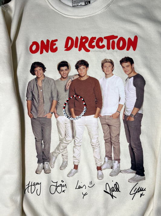 Buzo beige/rojo one direction